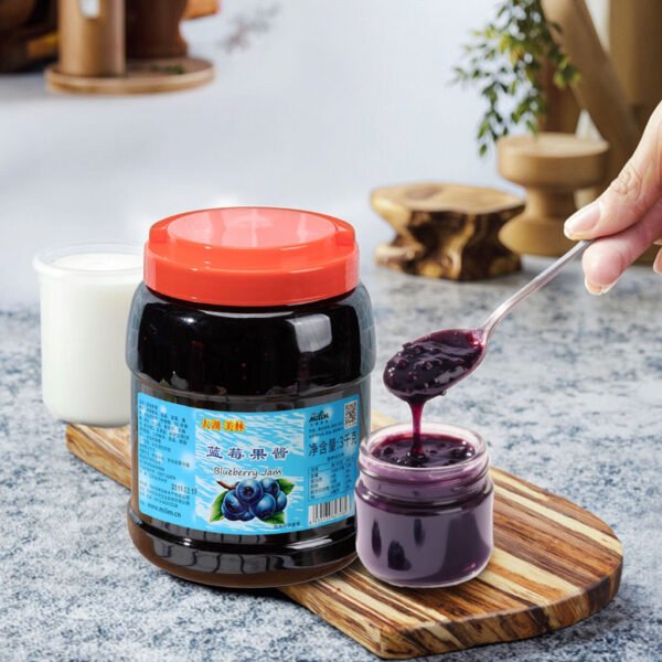 H553d2c10457348f0abcab4133fb2d078D.jpg Classic Timeless Taste Blueberry Jam 3KG Versatile Use Bottle Packaging with Mango Strawberry Orange Lemon Peach Ingredients